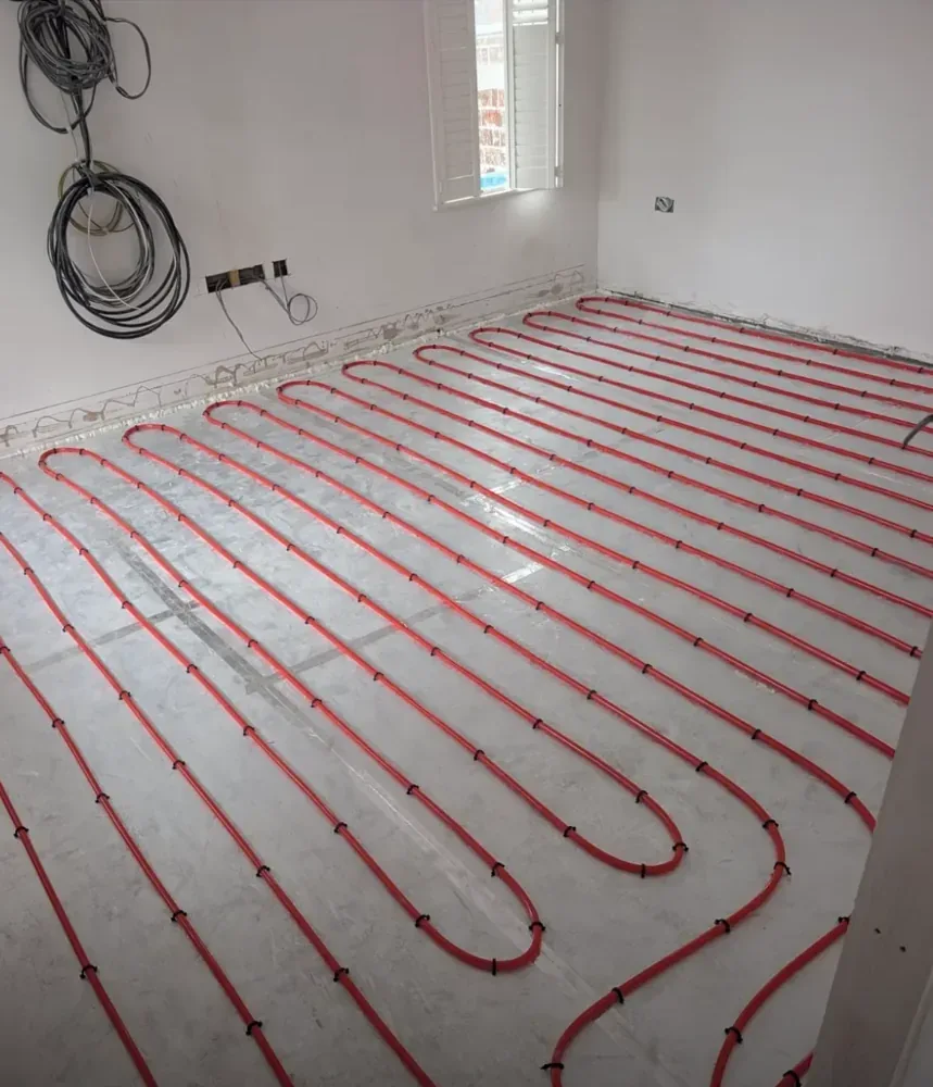 Underfloor heating loops installed ready for flooring